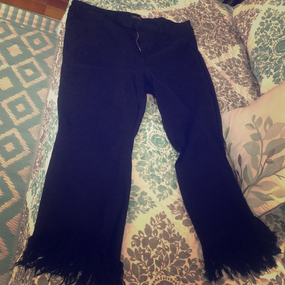 jeans with frills at the bottom